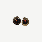KABE SHOP INC gold-plated earrings featuring a sculptural design with warm, round tortoise stone centers.