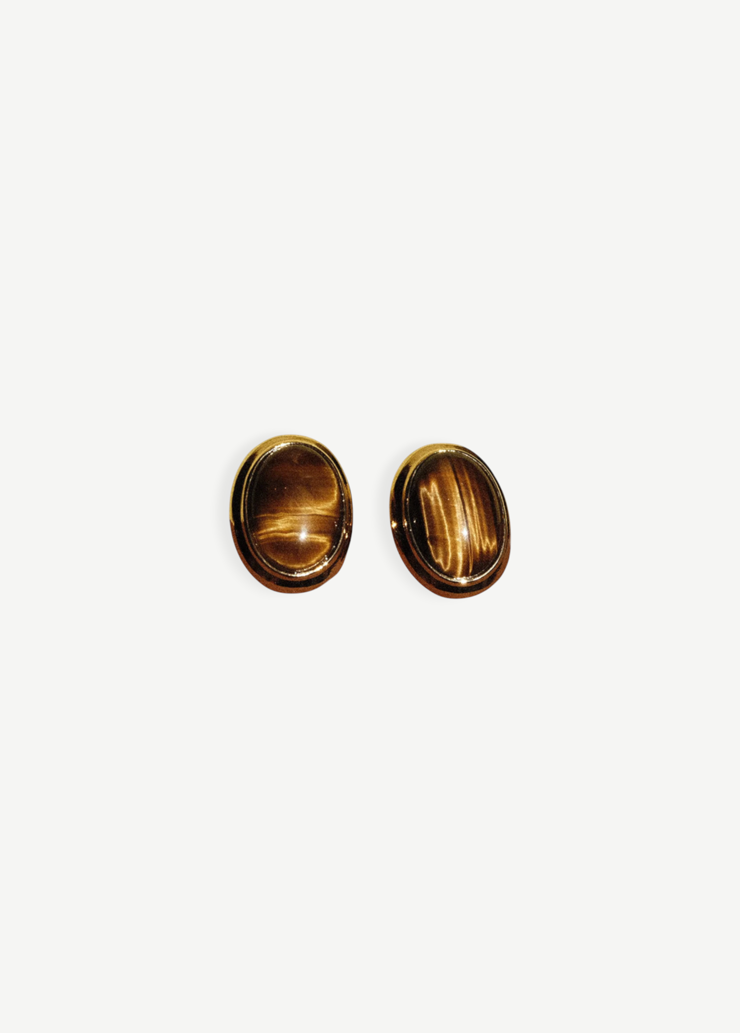 KABE SHOP INC oval cat-eye earrings featuring polished brown tiger eye stones in a vintage-inspired gold setting.