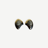 KABE SHOP INC geometric silver earrings featuring sculptural metal frames and detailed grey stone accents.