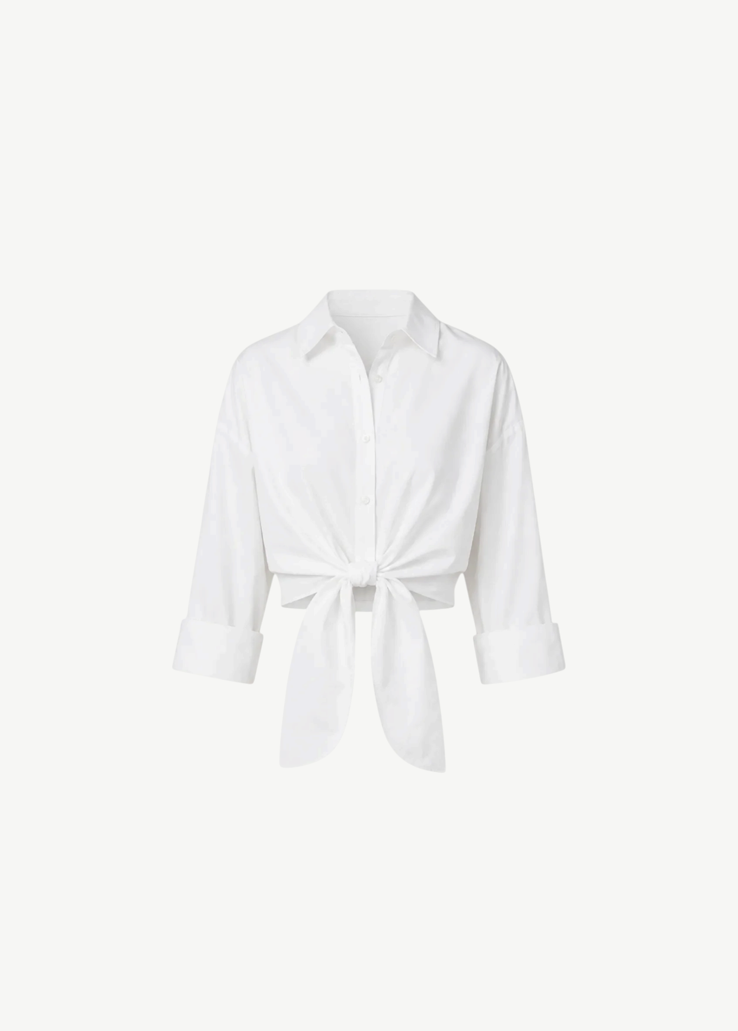 White Lisa Top featuring a collared button-down design, three-quarter length sleeves, a front tie waist, and a cropped silhouette ideal for high-waisted bottoms.