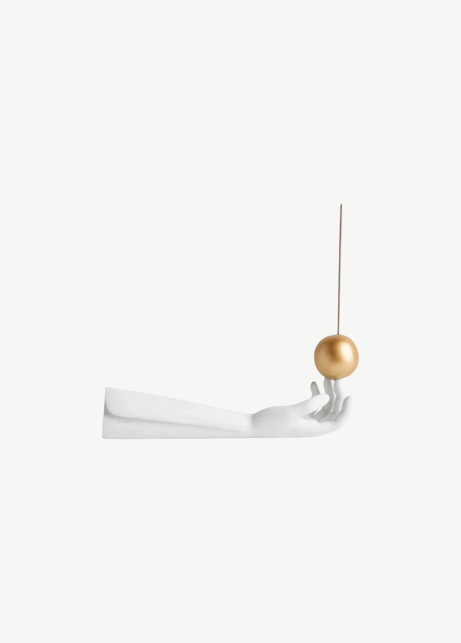 KABE SHOP INC Atlas porcelain incense holder featuring a white hand sculpture balancing a gold sphere with incense