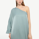 Model wearing KABE SHOP INC Sonia one-shoulder sage green maxi dress with a textured satin finish