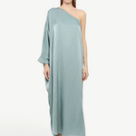 Model wearing a KABE SHOP INC Sonia one-shoulder sage green maxi dress with a relaxed, elegant silhouette.