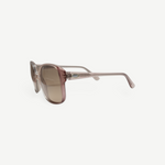 KABE SHOP INC vintage Carven sunglasses with translucent pink frames and brown gradient lenses, side view.