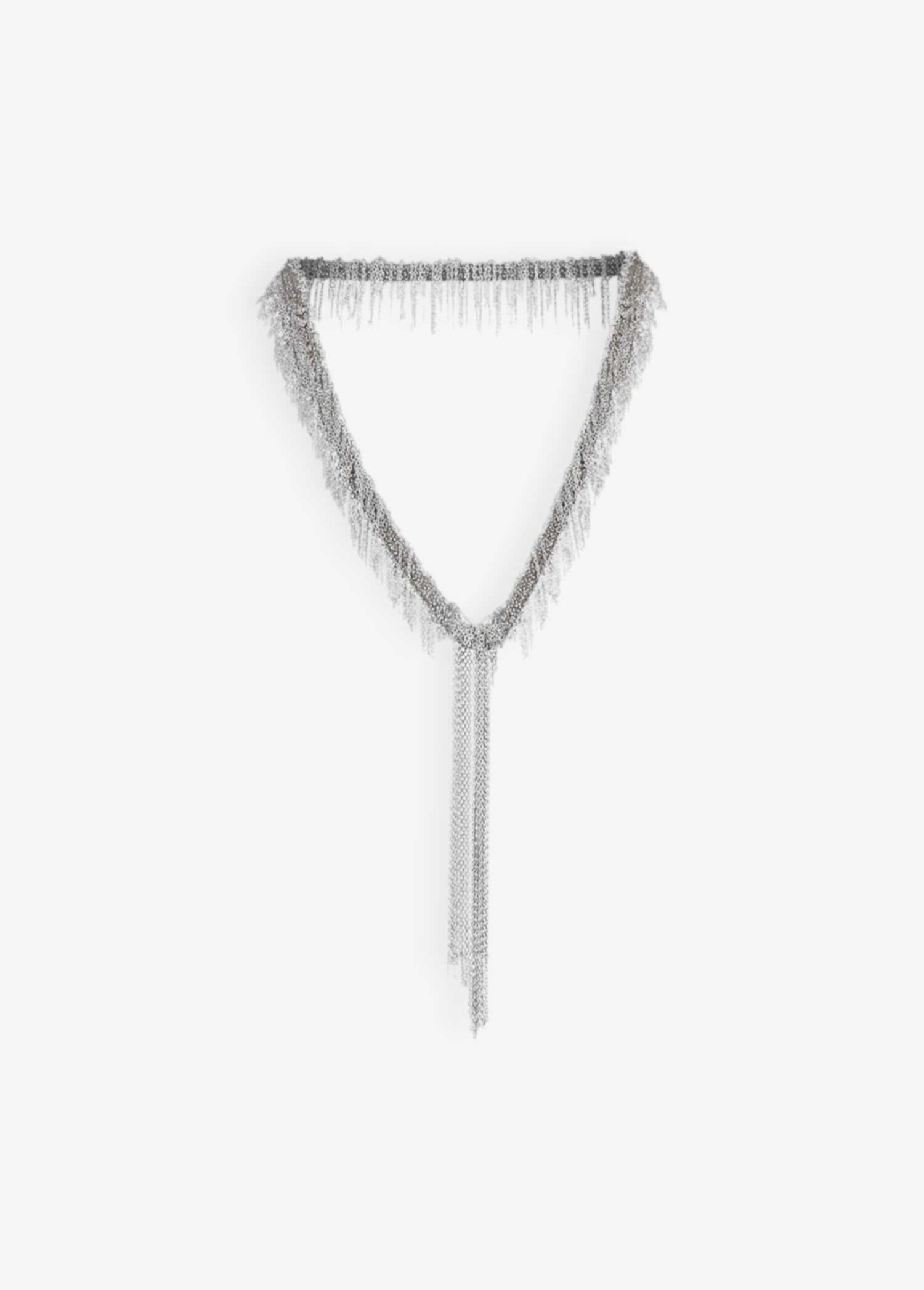The Lariat Necklace White Bronze is a V-shaped lariat necklace in a sleek silver tone, featuring an adjustable length and long cascading chains draping from the center like a metallic ribbon, shown against a plain white background.