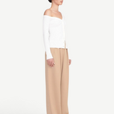KABE SHOP INC Craftsman Sweater in white, featuring an off-the-shoulder neckline and ribbed knit texture.