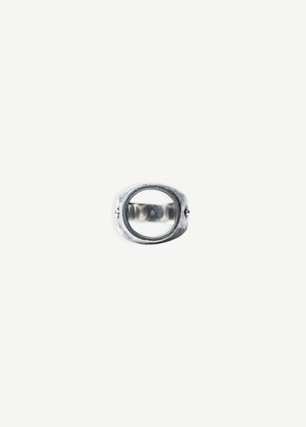 KABE SHOP INC Cricket ring featuring a unique circular open design in handcrafted textured silver
