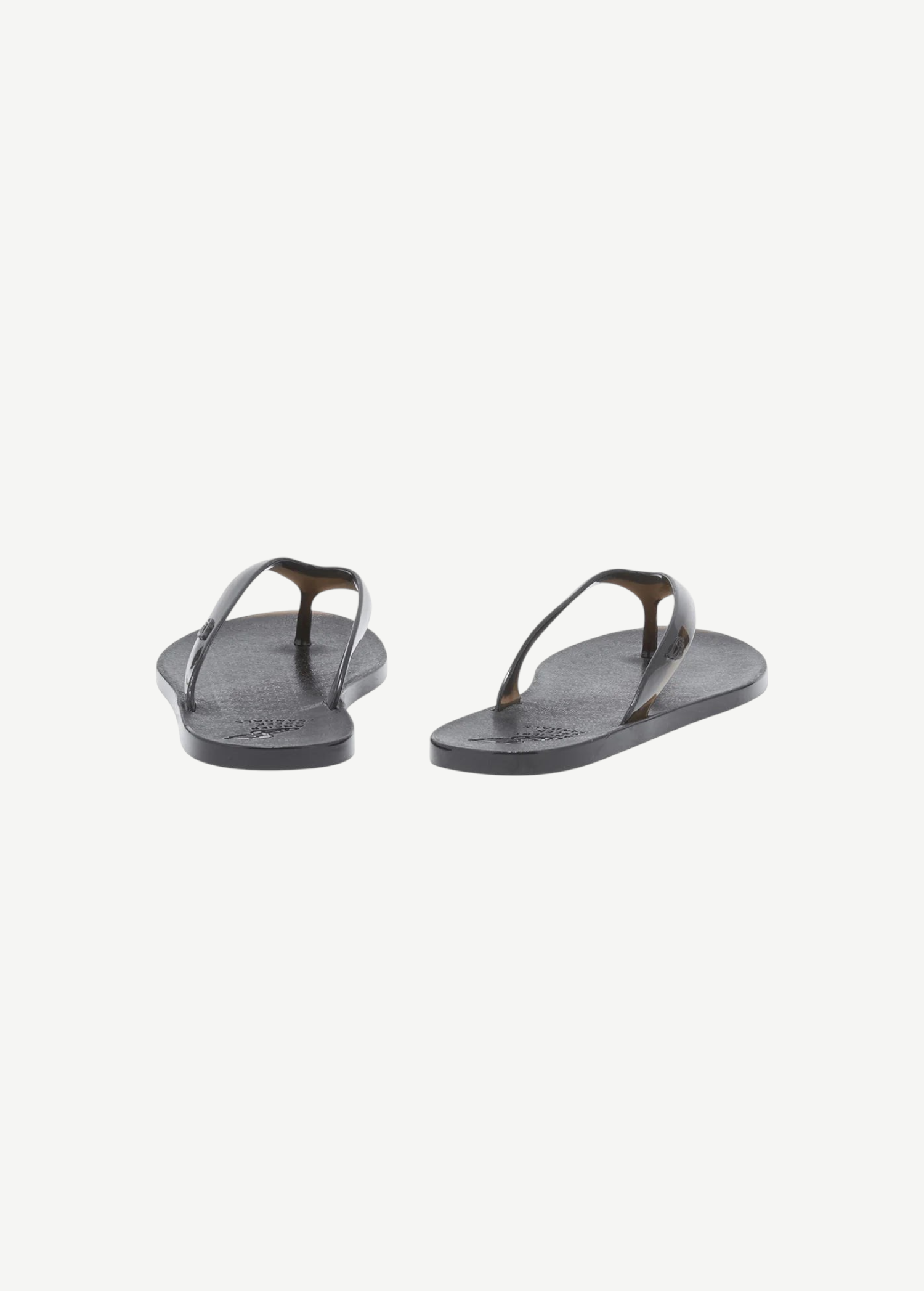 KABE SHOP INC black jelly flip flops with a minimalist design, perfect for beach and casual summer wear.