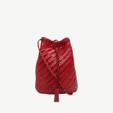 KABE SHOP INC red hand-crocheted buffalo calf leather shoulder bag with woven texture and a decorative tassel.