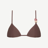Introducing the Equator Top: an eco-friendly brown triangle bikini top featuring thin, adjustable straps. The left strap is adorned with three decorative beads in pink and beige tones, blending stylish design with sustainable swimwear choices.