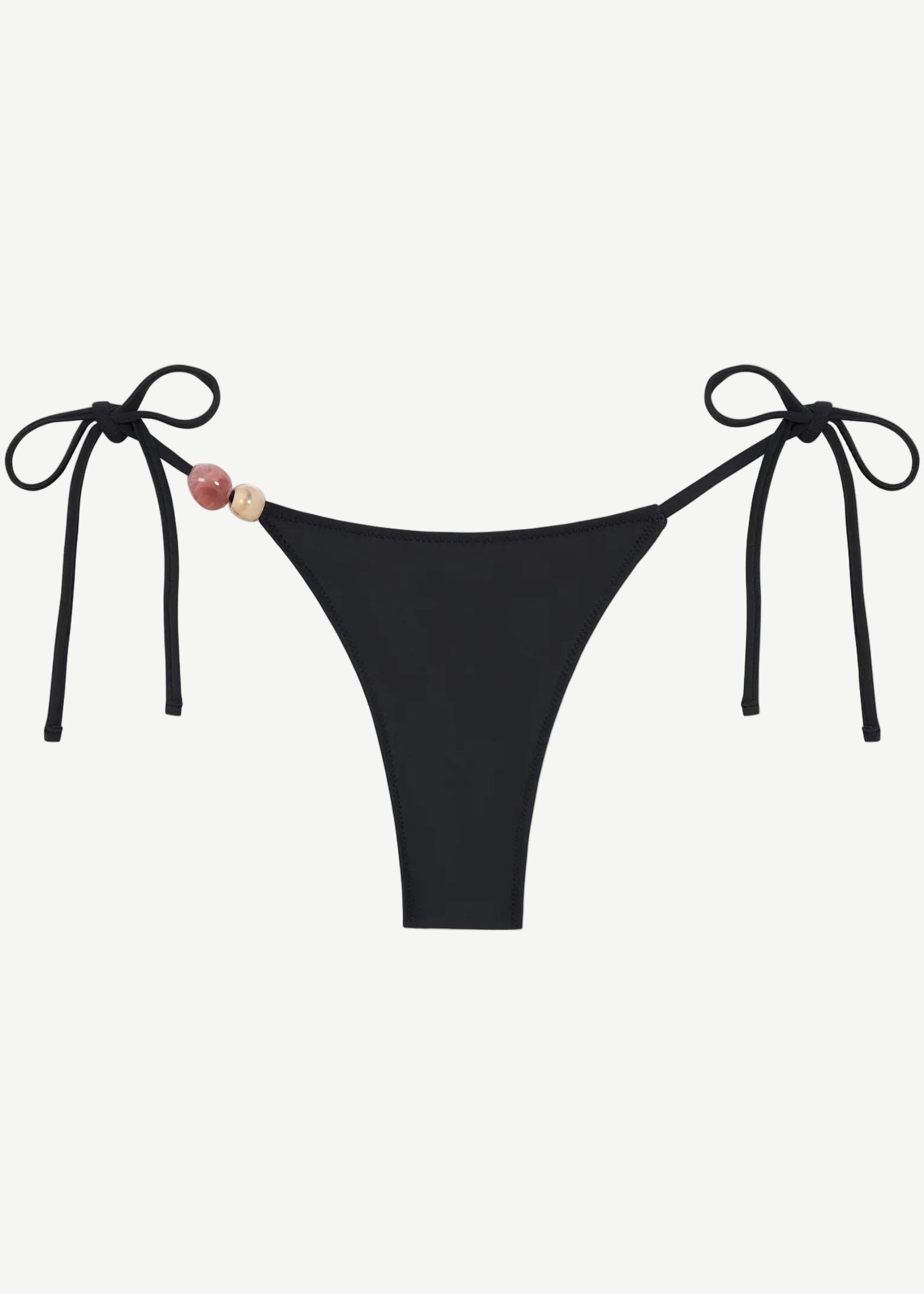 Introducing the Praia Bottom: a black bikini bottom featuring adjustable side ties and two decorative beads—one pink and one beige—on the left. Crafted from recycled polyamide, this minimal, sleek tie-bottom belongs to our eco-friendly swimwear collection, making it an ideal choice for stylish swimmers seeking sustainability.