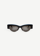 KABE SHOP INC BOZ sunglasses featuring a black cat-eye frame with a subtle light blue accent on a white background.