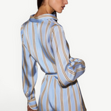 KABE SHOP INC Formentera romper in light blue with brown vertical stripes, collared neckline, and self-tie waist.