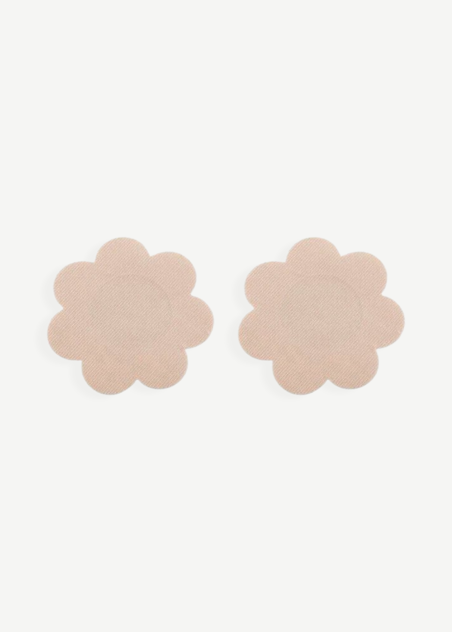 KABE SHOP INC Nippz disposable flower-shaped adhesive nipple covers in a discreet nude tone for smooth coverage.
