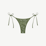 Praia Bottom in olive green with a sparkling sequin overlay and adjustable side ties, displayed on a white background.