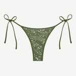 Praia Bottom in olive green with a sparkling sequin overlay and adjustable side ties, displayed on a white background.