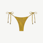 The Praia Bottom is a yellow bikini bottom with a subtle dotted pattern and adjustable side ties, each embellished with small decorative beads. Designed as eco-friendly swimwear, this piece is shown against a plain white background.