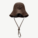 KABE SHOP INC brown woven straw hat bag with a wide brim and adjustable chin strap in a contemporary design