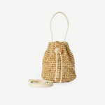 KABE SHOP INC Nirmala bucket bag in woven raffia with white leather trim and a unique crystal drawstring closure.
