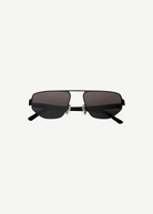 Introducing the Victoire rectangular black sunglasses with dark lenses and slim metal frames, accented by subtle gold branding at the temple. Displayed facing forward on a white background, these sunglasses deliver stylish UV400 protection for dependable eye care.