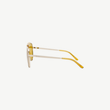 KABE SHOP INC Amelia pilot sunglasses with gold metal frames and yellow tinted lenses, side profile view.