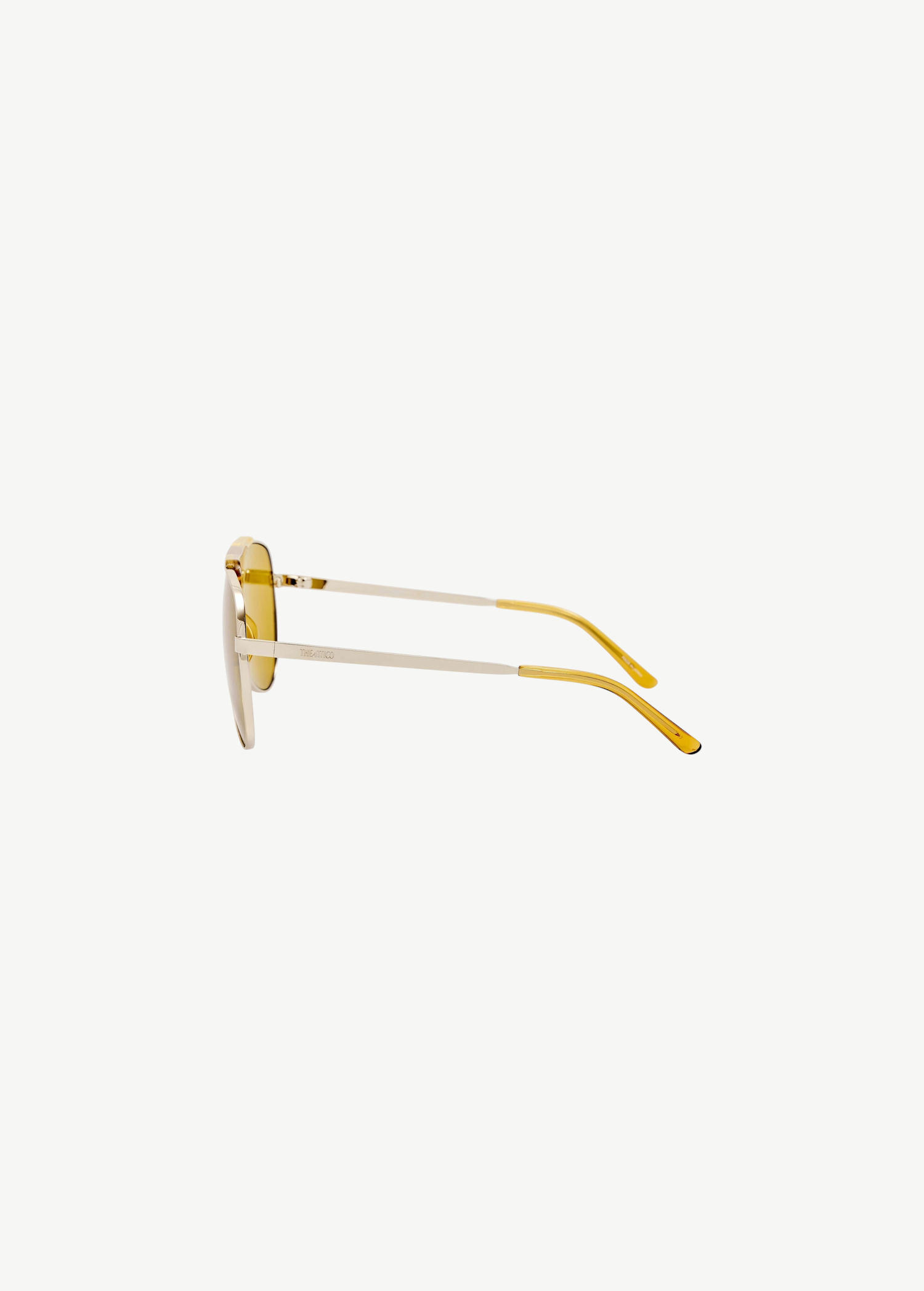 KABE SHOP INC Amelia pilot sunglasses with gold metal frames and yellow tinted lenses, side profile view.