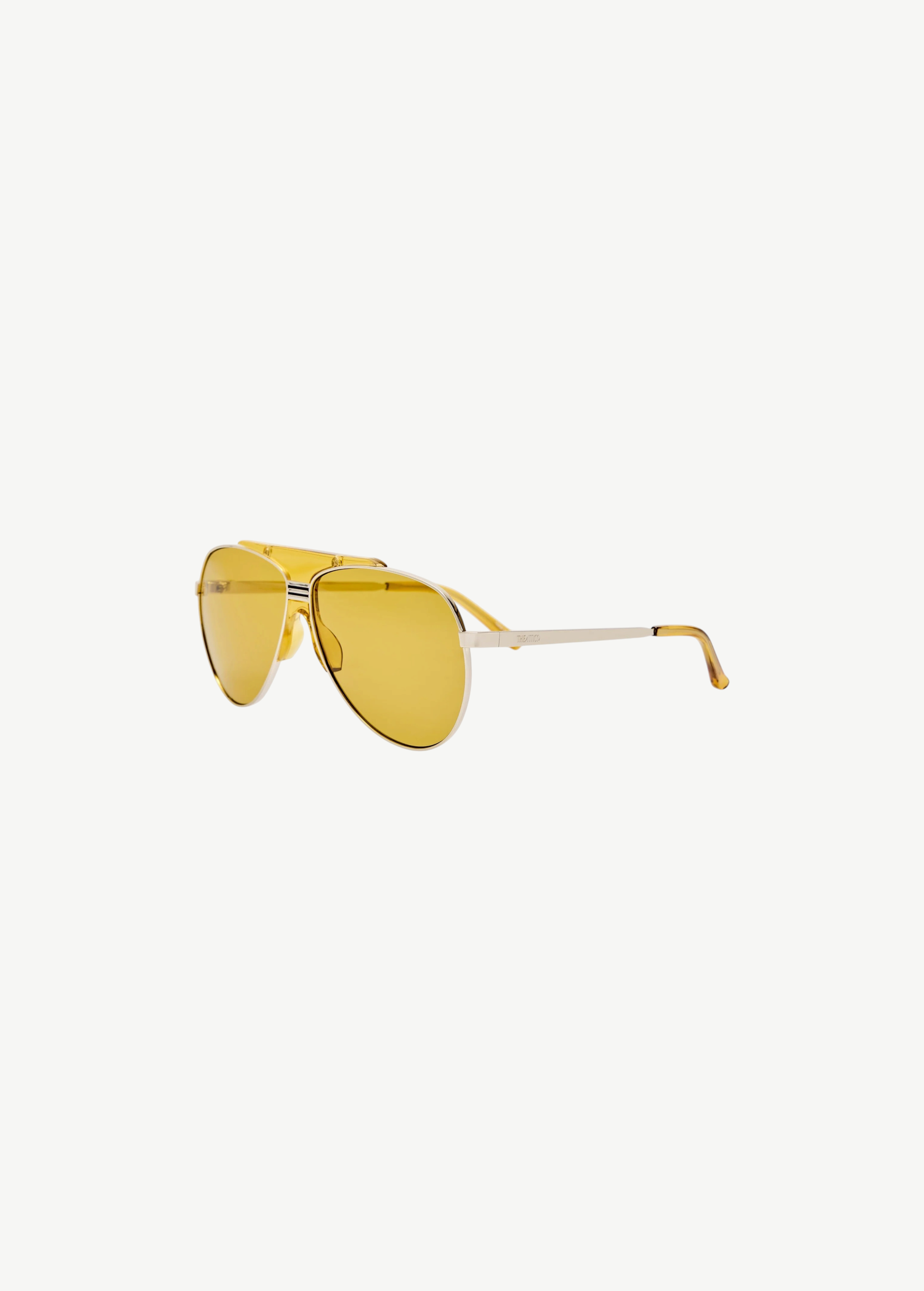 KABE SHOP INC Amelia sunglasses featuring a modern pilot silhouette with a yellow frame and matching tinted lenses.