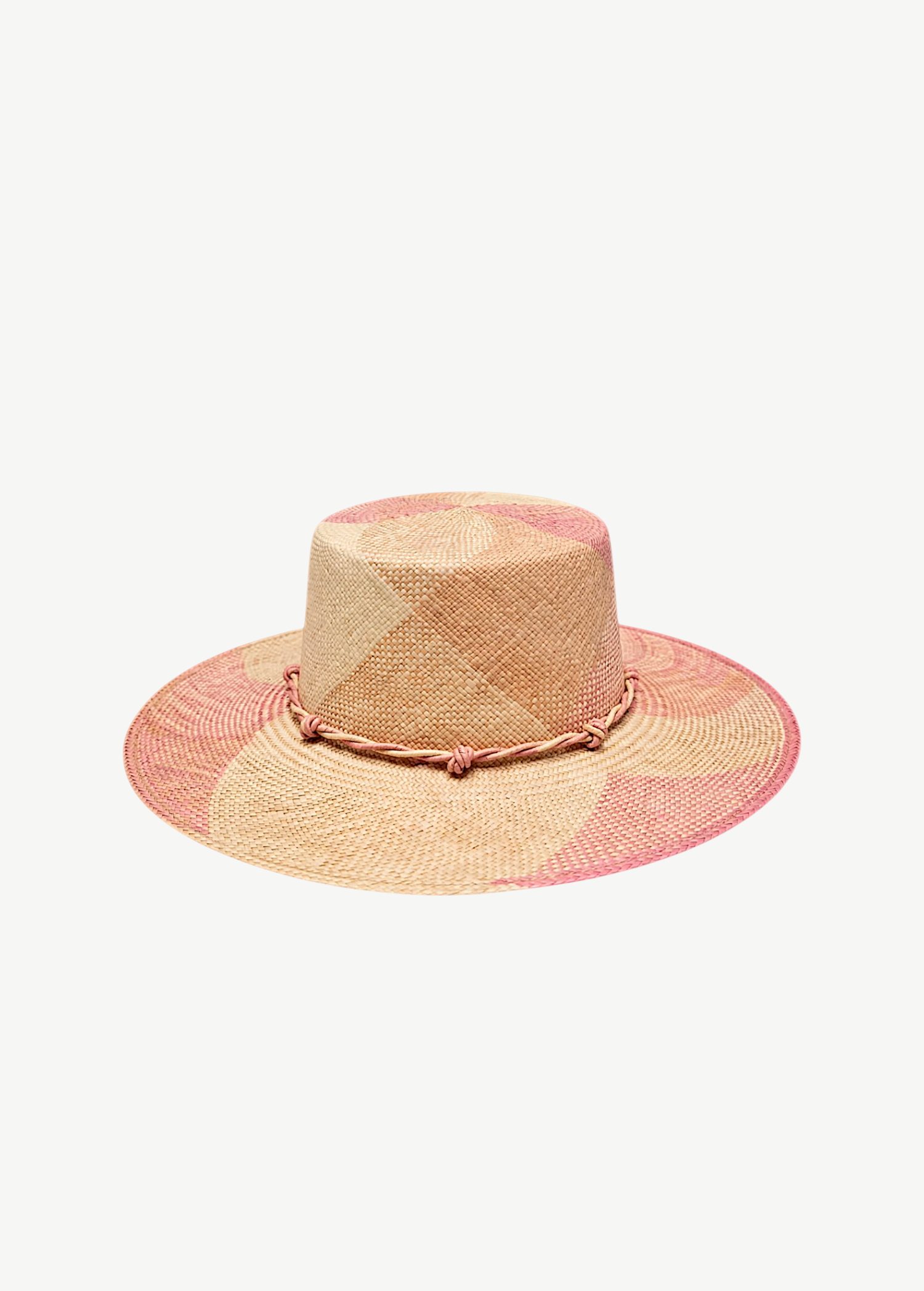 KABE SHOP INC Awisqa hat featuring a woven straw design with geometric pink and beige patterns and a braided trim.