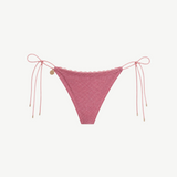 KABE SHOP INC Bas Paris metallic pink bikini bottom with lace trim, side ties, and gold-tone lion-head medallion.
