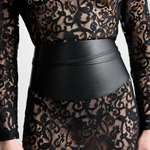 KABE SHOP INC Undone Corset Belt in black calfskin leather worn over a sheer black lace dress for a sculpted waist