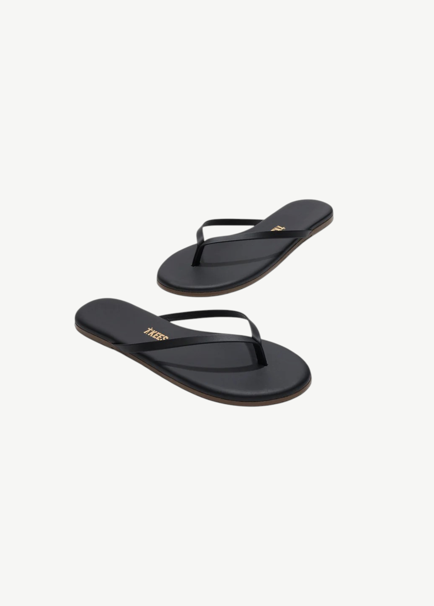 KABE SHOP INC Lily Liners minimalist black leather flip flops with a cushioned insole and slim silhouette.