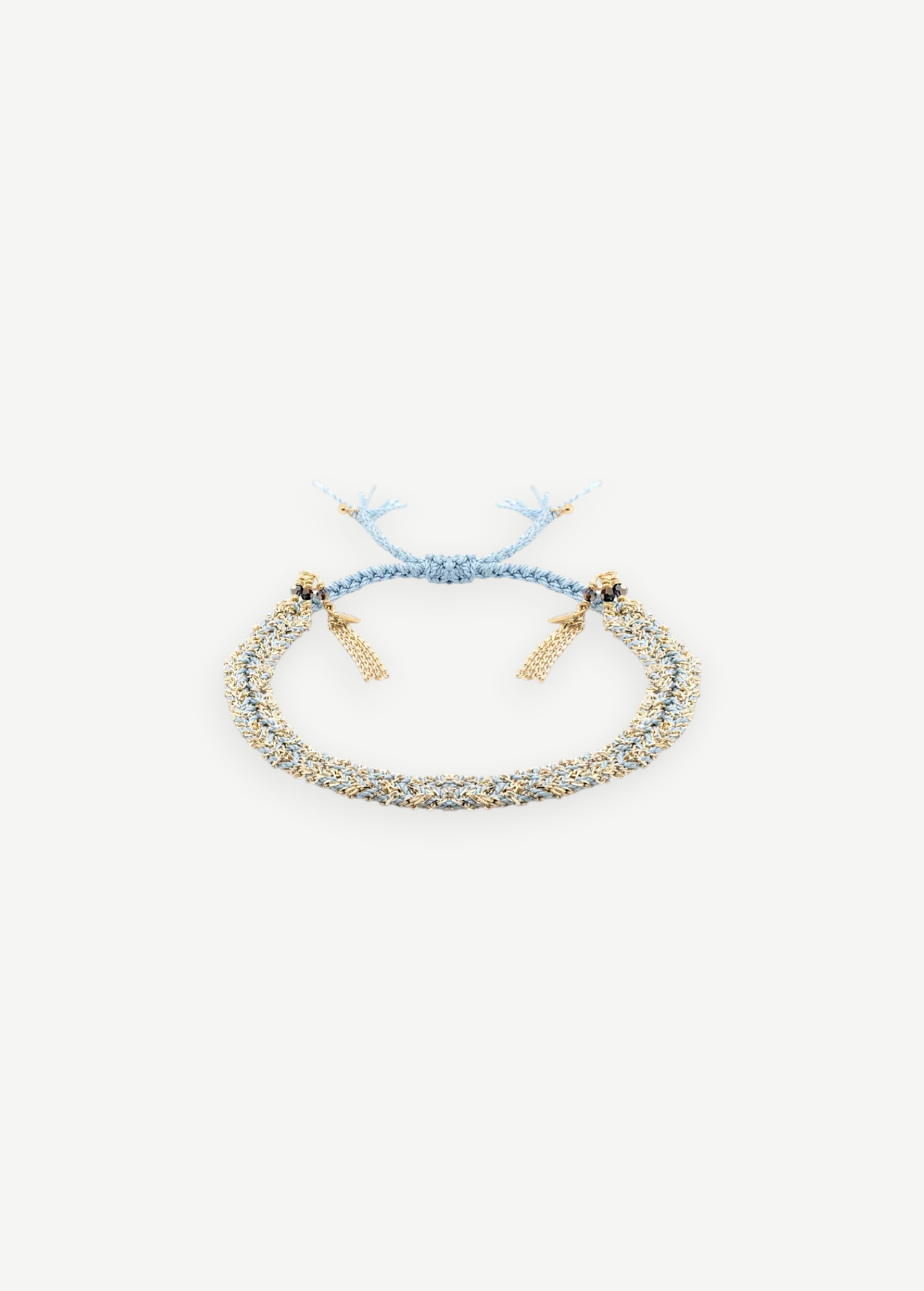 KABE SHOP INC N° 183 braided bracelet in light blue and gold metallic thread with delicate tassel charms