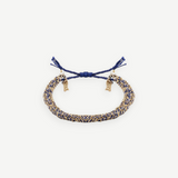 KABE SHOP INC N° 183 braided bracelet featuring interwoven navy blue cord and gold metallic threads with adjustable ties