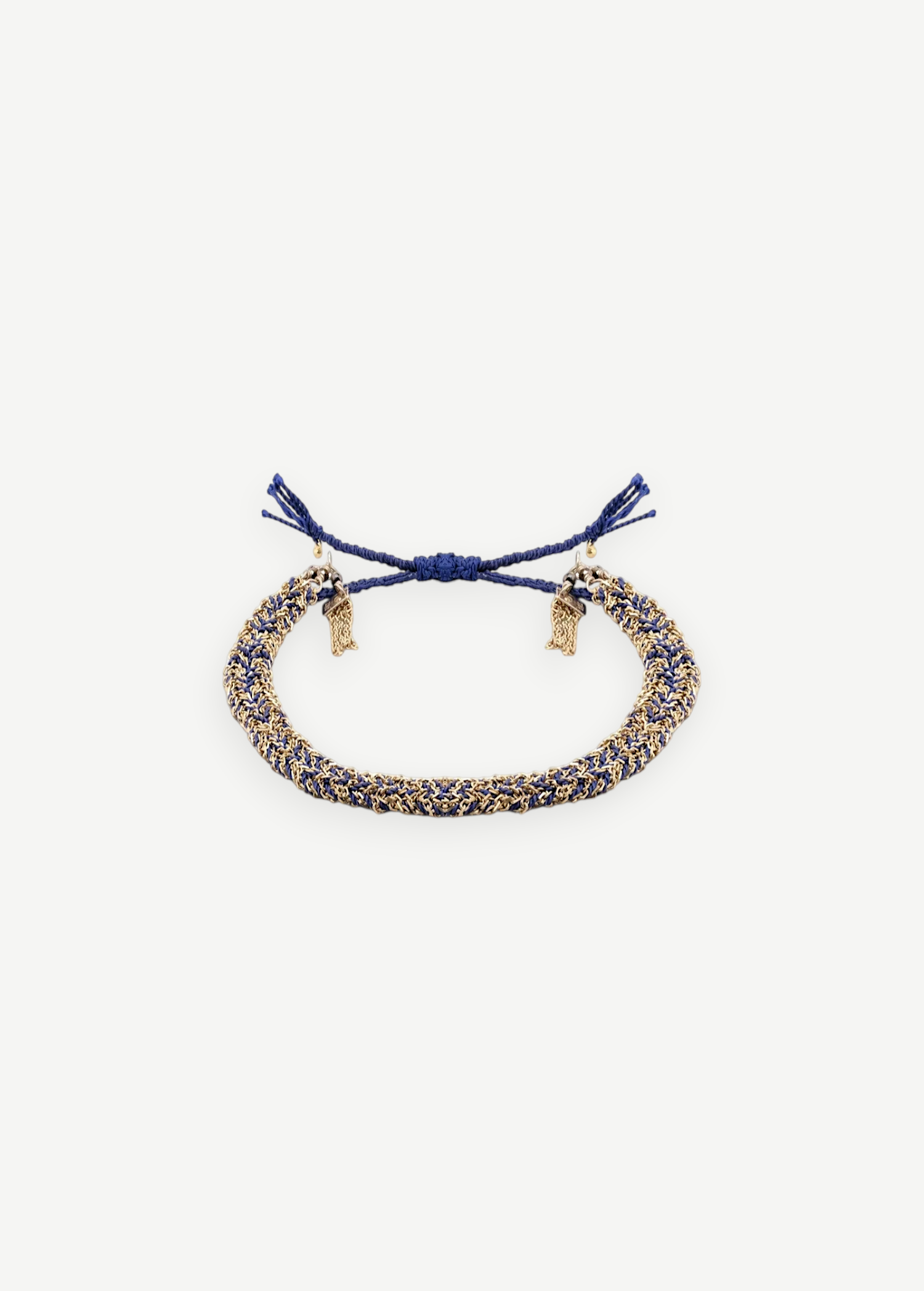 KABE SHOP INC N° 183 braided bracelet featuring interwoven navy blue cord and gold metallic threads with adjustable ties