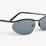 KABE SHOP INC Charlotte sunglasses featuring a sleek black metal oval frame and dark blue lenses with logo detailing.