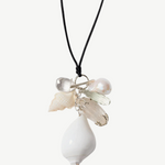 KABE SHOP INC conch shell and freshwater baroque pearl necklace on black satin cord with crystal accents