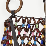 KABE SHOP INC Del Mar bucket bag featuring a brown wooden bead lattice design with colorful glass accents and rings.