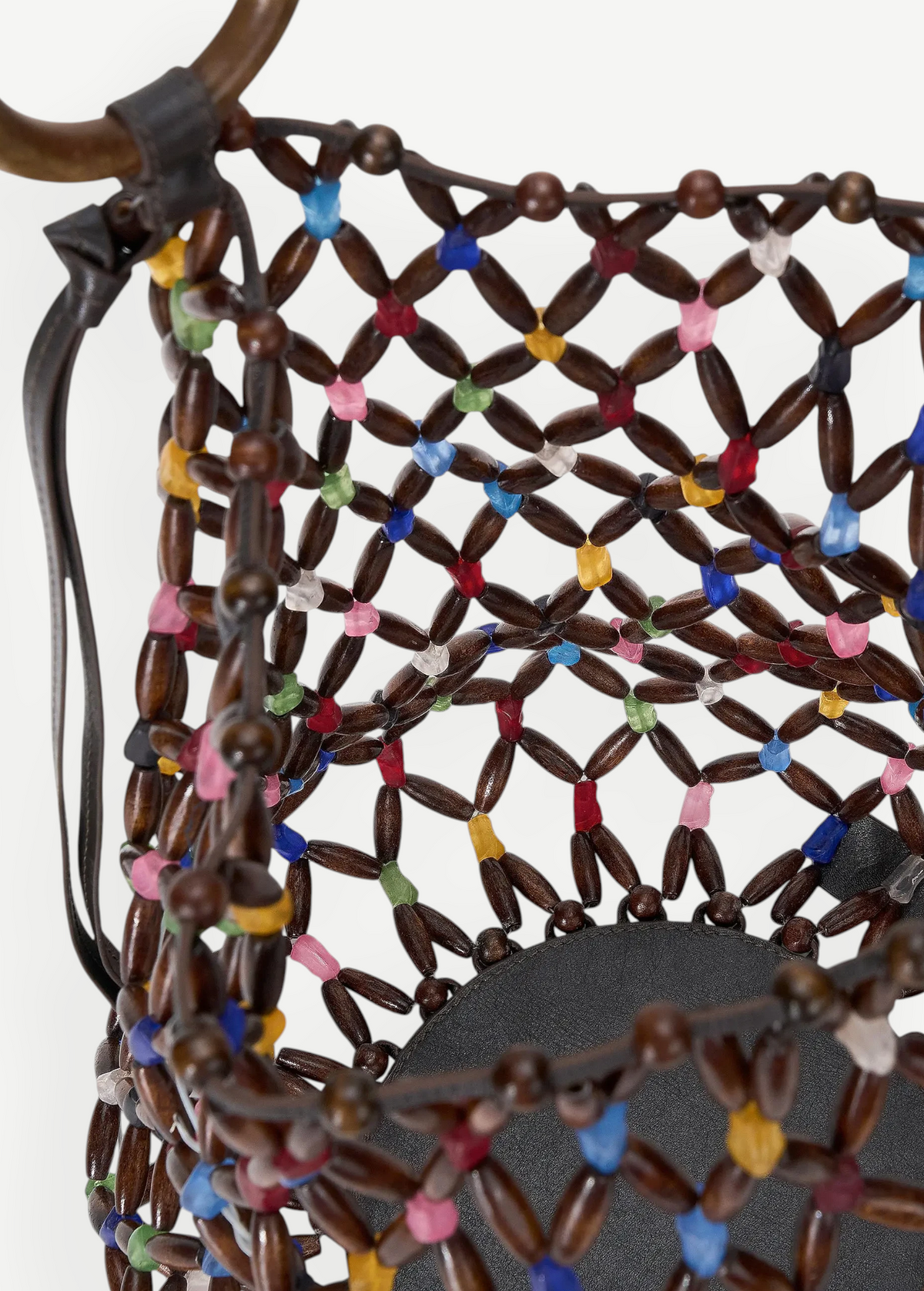 KABE SHOP INC Del Mar bucket bag featuring a brown wooden bead lattice design with colorful accents and a round base