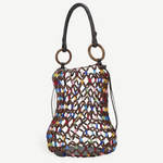KABE SHOP INC Del Mar bucket bag featuring a brown wooden beaded net design with colorful accents and ring handles.