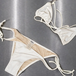 KABE SHOP INC Dolores tie bottom bikini set in white with beaded strap detail on a metallic background