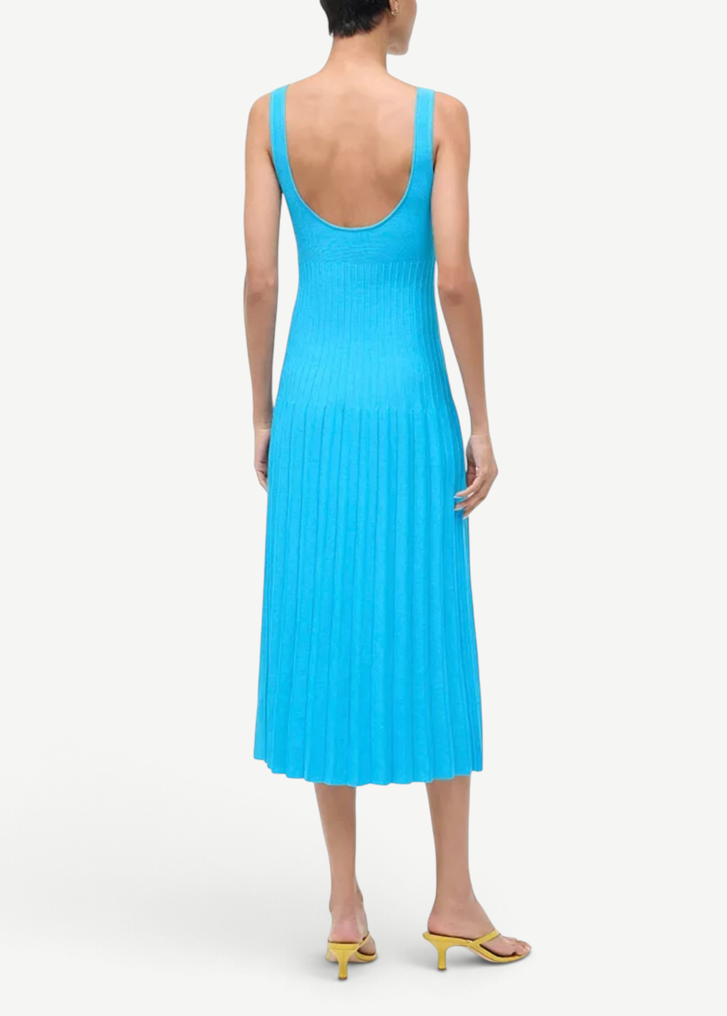 Back view of KABE SHOP INC Ellison cobalt blue ribbed knit midi dress with a scoop back on a model.