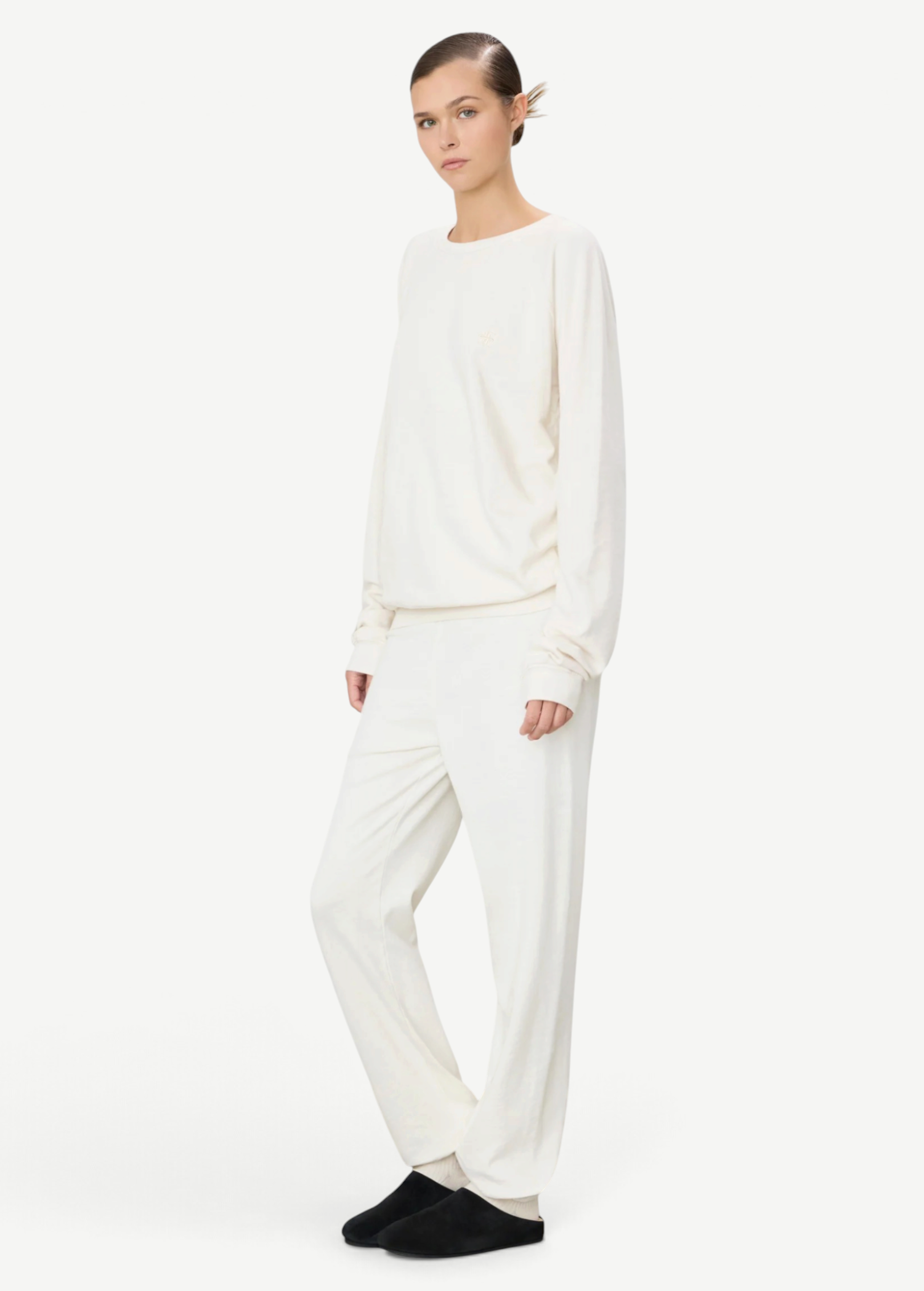 KABE SHOP INC ÉTERNE cream French terry sweatpants and matching sweatshirt worn by a model in a relaxed fit