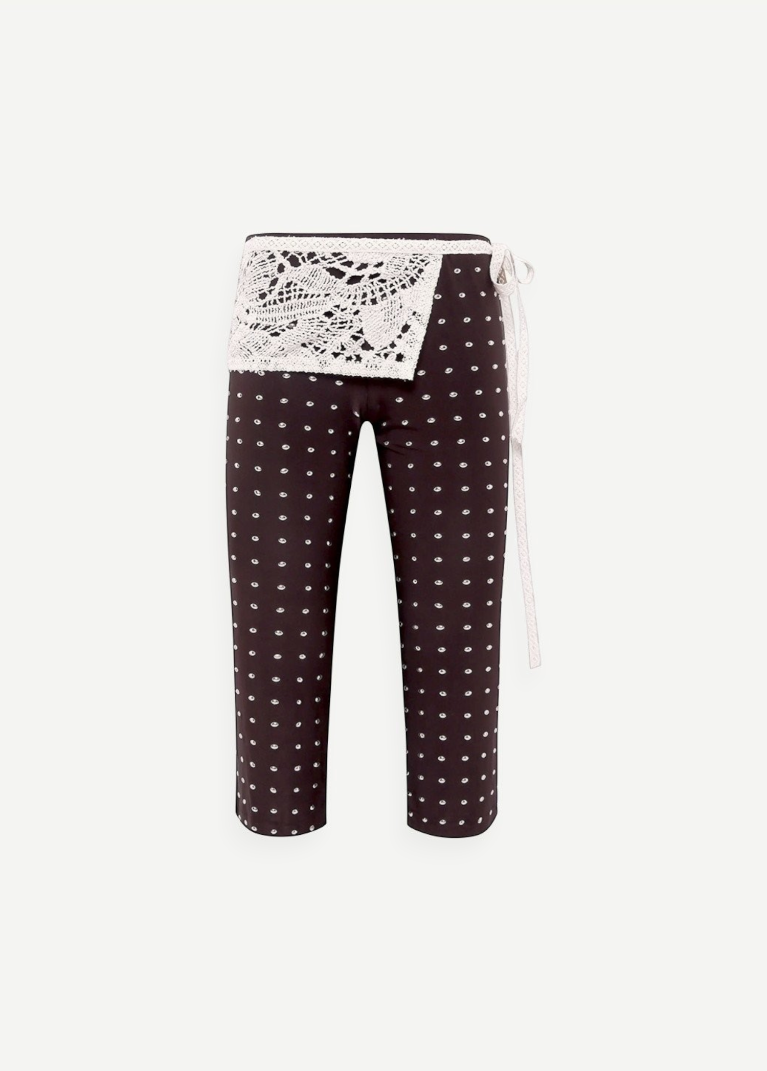 KABE SHOP INC Gianna pants in black with white polka dots, featuring a decorative white crochet waist detail.