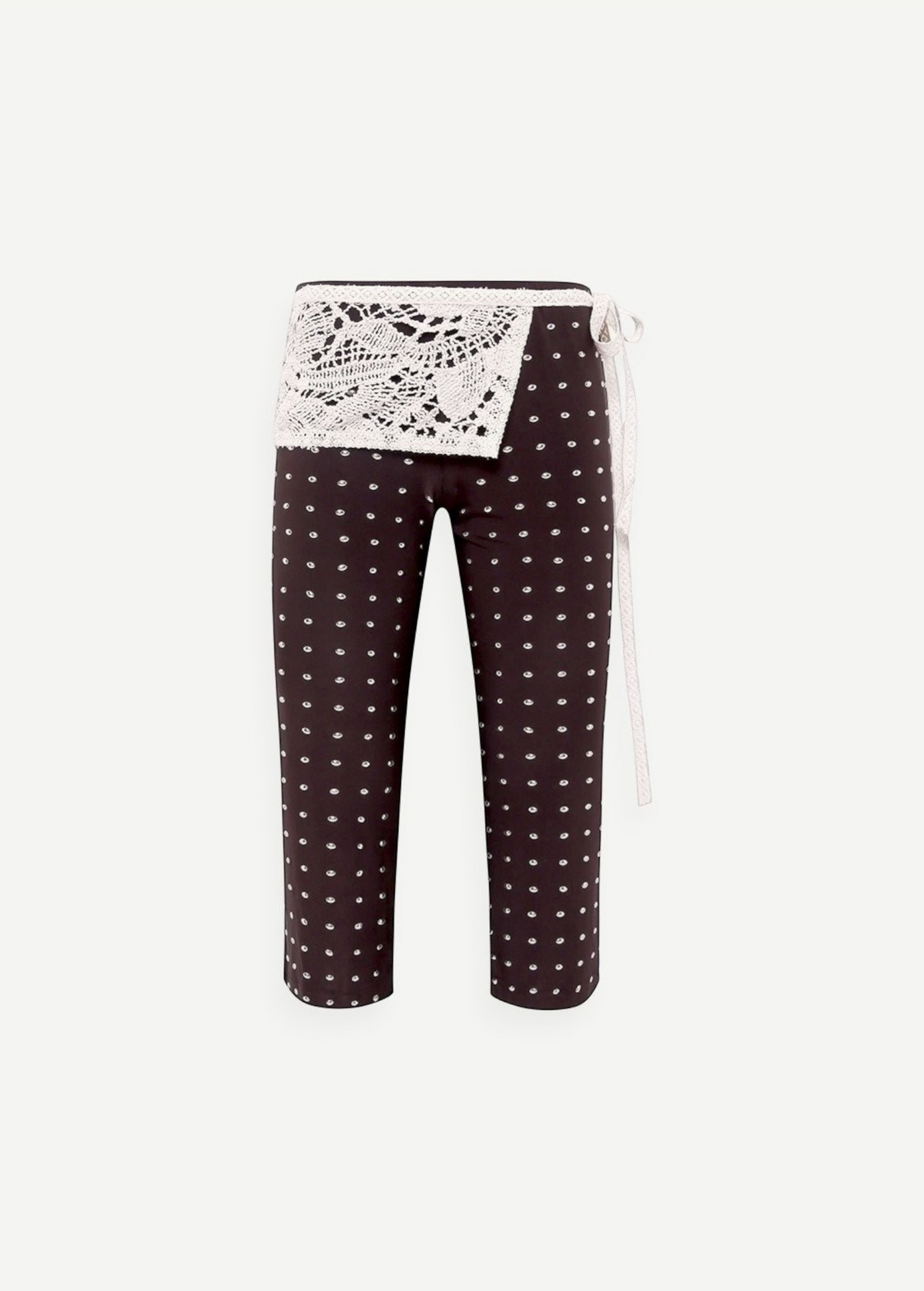 KABE SHOP INC Gianna pants in black with white polka dots, featuring a decorative white crochet waist detail.