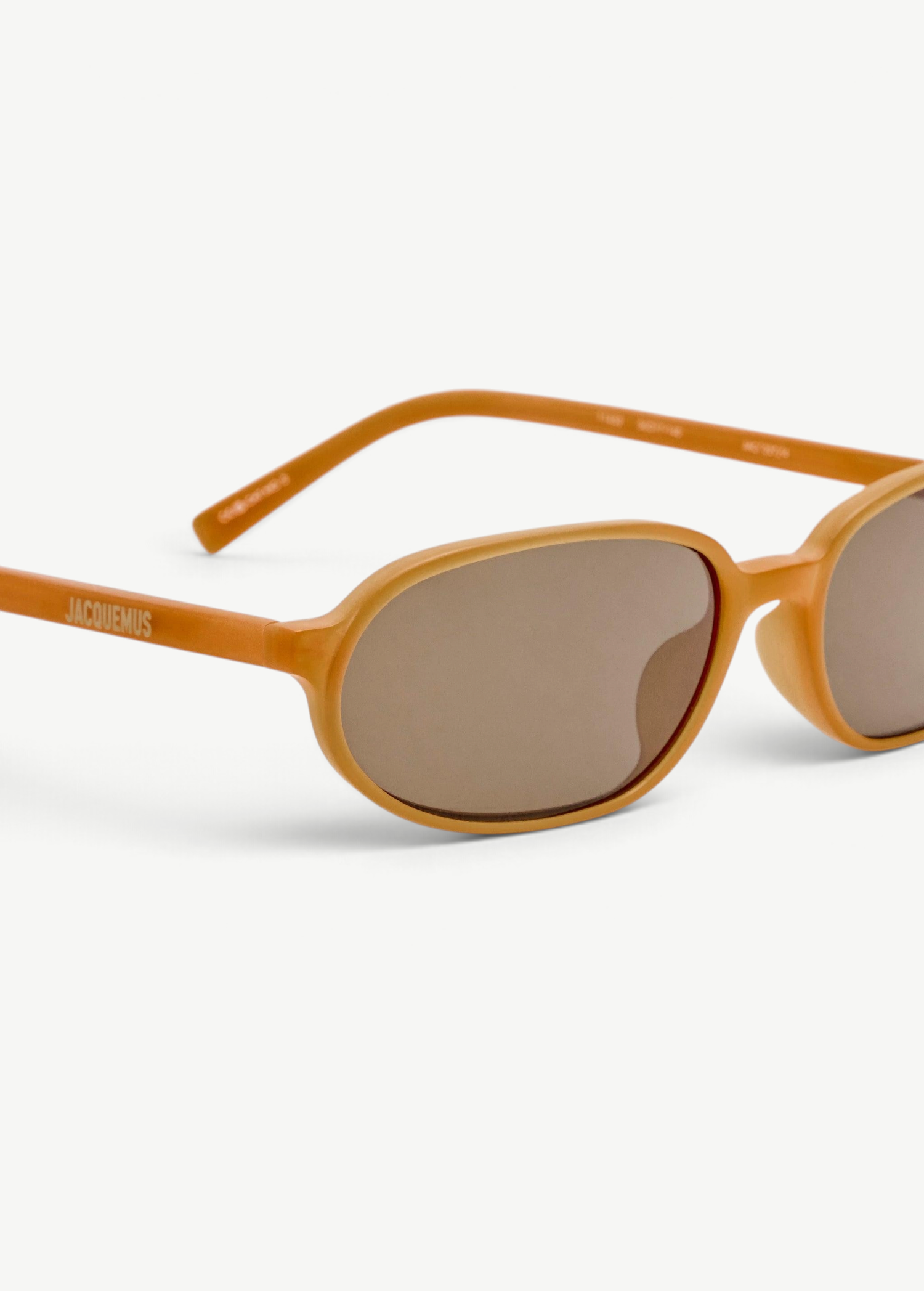 KABE SHOP INC Jacquemus Notte sunglasses in caramel acetate with brown lenses and gold branding, side angle view.