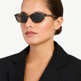 KABE SHOP INC Libby sunglasses with angular tortoiseshell acetate frames and brown lenses worn by a woman