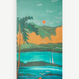 KABE SHOP INC Magdalena Pareo featuring a vibrant landscape print with palm trees, mountains, and a sailboat.