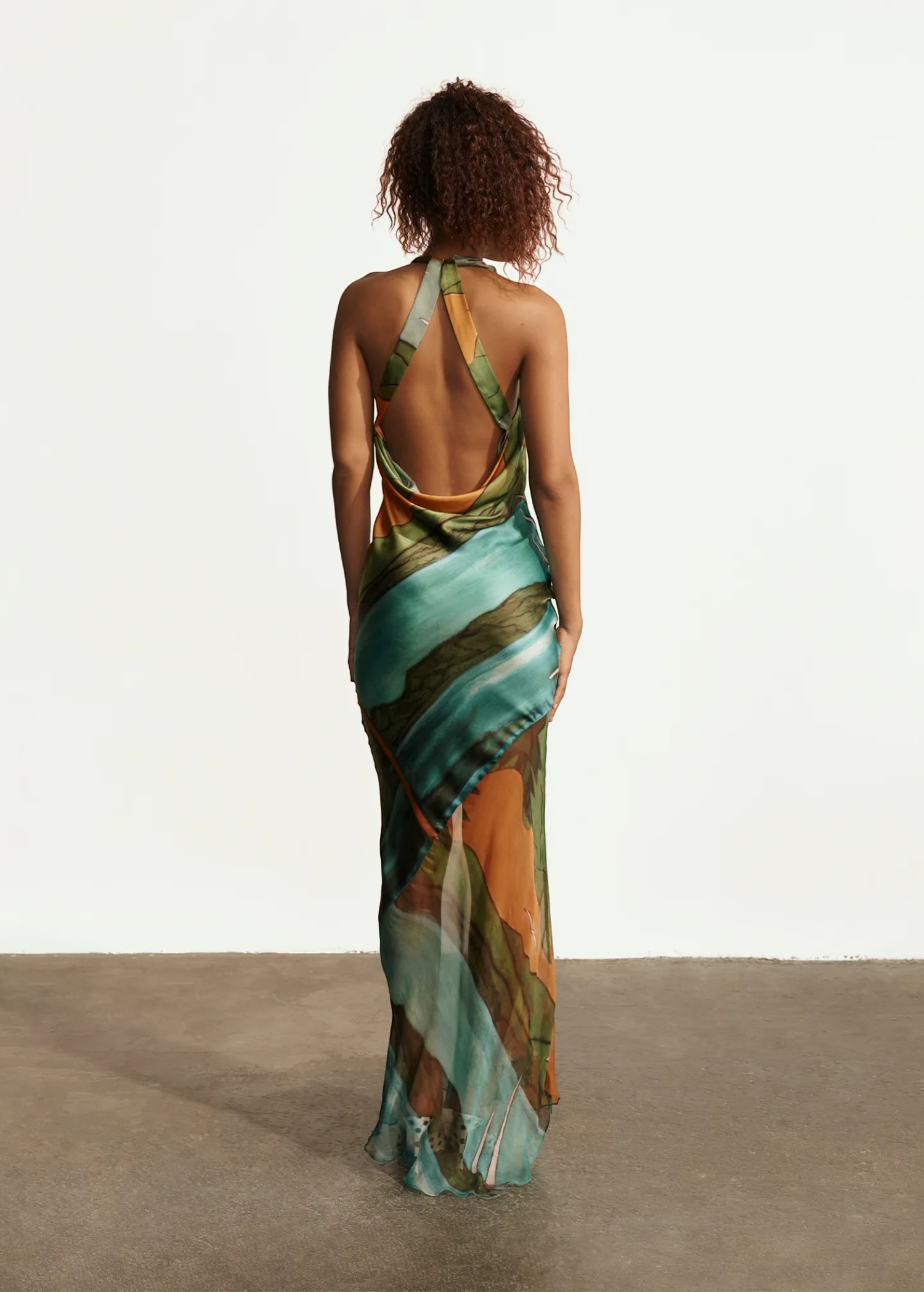 KABE SHOP INC Magdalena long silk maxi dress with halter neckline and abstract landscape print, back view