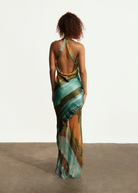 KABE SHOP INC Magdalena long silk maxi dress with halter neckline and abstract landscape print, back view