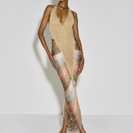 Model wearing a KABE SHOP INC Melissa dress with a plunging halter neckline and metallic multi-coloured cord detail.
